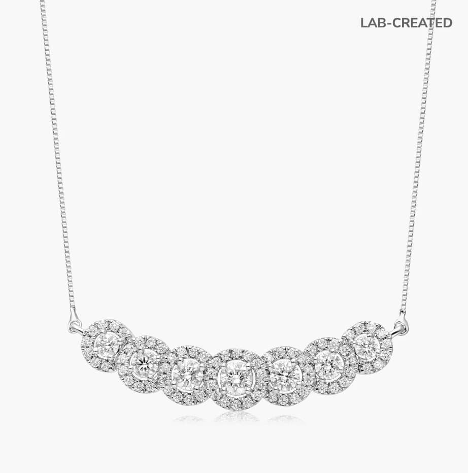 7 Stone Halo Lab Grown Diamond Necklace - Image 1 7 Stone Halo Lab Grown Diamond Necklace, view 1 of 4