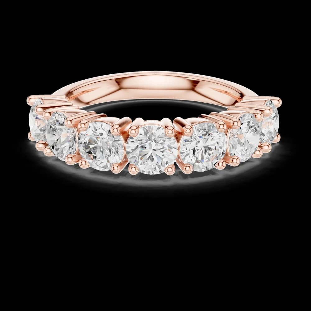 Classic Shared Prong Seven Stone Eternity Band - Image 1 Classic Shared Prong Seven Stone Eternity Band, view 1 of 6